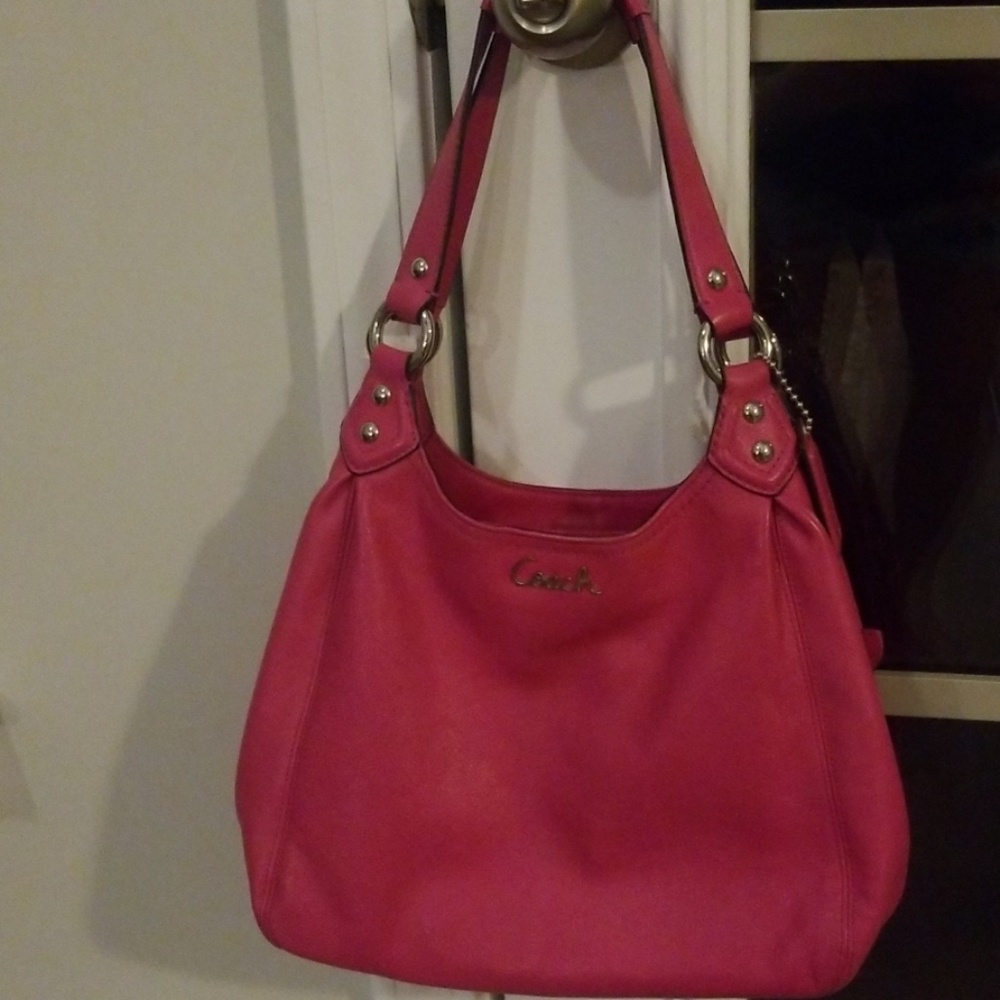 Barely used pink leather coach purse